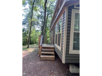 Have you been dreaming having your own permanent campsite?  Look on Voyager Village Country Club - Voyager in Wisconsin - for sale on GolfHomes.com, golf home, golf lot