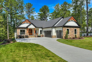 SOME PEOPLE DO EVERYTHING RIGHT! This LAKE FRONT home was CUSTOM on Monticello Golf Club At Savannah Lakes in South Carolina - for sale on GolfHomes.com, golf home, golf lot