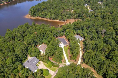 SOME PEOPLE DO EVERYTHING RIGHT! This LAKE FRONT home was CUSTOM on Monticello Golf Club At Savannah Lakes in South Carolina - for sale on GolfHomes.com, golf home, golf lot