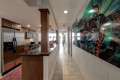 Experience elevated coastal living in this stunning 8th-floor on Palmilla Beach Golf Club in Texas - for sale on GolfHomes.com, golf home, golf lot
