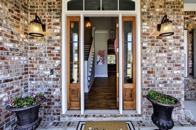 Enjoy refined Lowcountry luxury in this exceptional custom on Savannah Quarters Country Club in Georgia - for sale on GolfHomes.com, golf home, golf lot