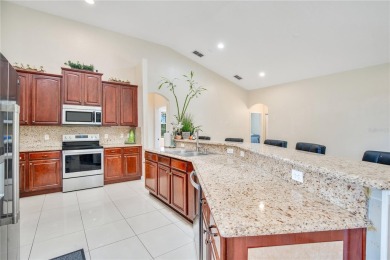 Welcome to your dream home! Nestled on a full acre of land in a on Wedgefield Golf Club in Florida - for sale on GolfHomes.com, golf home, golf lot