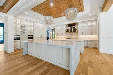 Exceptional in both style and scale, this extraordinary on Isleworth Golf and Country Club in Florida - for sale on GolfHomes.com, golf home, golf lot