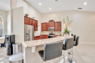 Welcome to your dream home! Nestled on a full acre of land in a on Wedgefield Golf Club in Florida - for sale on GolfHomes.com, golf home, golf lot