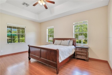 Welcome to your dream home! Nestled on a full acre of land in a on Wedgefield Golf Club in Florida - for sale on GolfHomes.com, golf home, golf lot