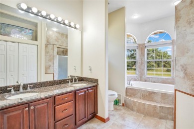 Welcome to your dream home! Nestled on a full acre of land in a on Wedgefield Golf Club in Florida - for sale on GolfHomes.com, golf home, golf lot