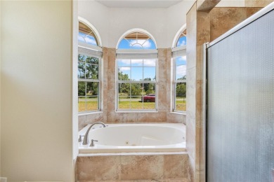 Welcome to your dream home! Nestled on a full acre of land in a on Wedgefield Golf Club in Florida - for sale on GolfHomes.com, golf home, golf lot