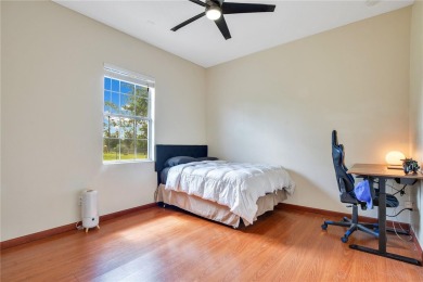 Welcome to your dream home! Nestled on a full acre of land in a on Wedgefield Golf Club in Florida - for sale on GolfHomes.com, golf home, golf lot