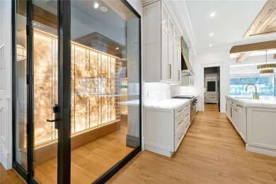 Exceptional in both style and scale, this extraordinary on Isleworth Golf and Country Club in Florida - for sale on GolfHomes.com, golf home, golf lot