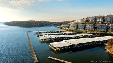 Top-floor 3 bedroom, 2 bath Palisades condo with beautiful main on Tan-Tar-A Golf Club in Missouri - for sale on GolfHomes.com, golf home, golf lot