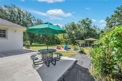Welcome to your dream home! Nestled on a full acre of land in a on Wedgefield Golf Club in Florida - for sale on GolfHomes.com, golf home, golf lot