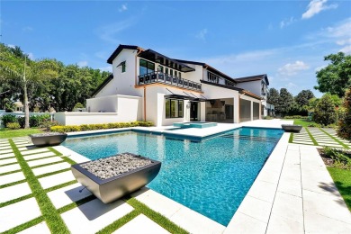 Exceptional in both style and scale, this extraordinary on Isleworth Golf and Country Club in Florida - for sale on GolfHomes.com, golf home, golf lot