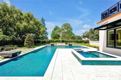 Exceptional in both style and scale, this extraordinary on Isleworth Golf and Country Club in Florida - for sale on GolfHomes.com, golf home, golf lot