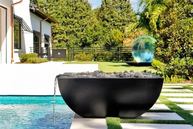 Exceptional in both style and scale, this extraordinary on Isleworth Golf and Country Club in Florida - for sale on GolfHomes.com, golf home, golf lot