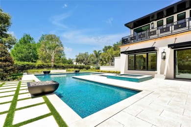 Exceptional in both style and scale, this extraordinary on Isleworth Golf and Country Club in Florida - for sale on GolfHomes.com, golf home, golf lot