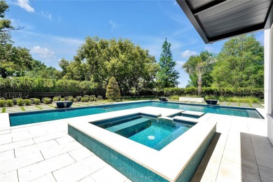 Exceptional in both style and scale, this extraordinary on Isleworth Golf and Country Club in Florida - for sale on GolfHomes.com, golf home, golf lot