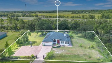 Welcome to your dream home! Nestled on a full acre of land in a on Wedgefield Golf Club in Florida - for sale on GolfHomes.com, golf home, golf lot