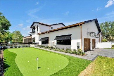 Exceptional in both style and scale, this extraordinary on Isleworth Golf and Country Club in Florida - for sale on GolfHomes.com, golf home, golf lot