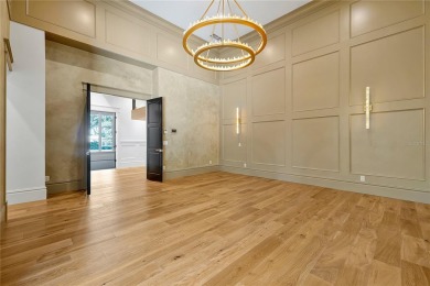 Exceptional in both style and scale, this extraordinary on Isleworth Golf and Country Club in Florida - for sale on GolfHomes.com, golf home, golf lot