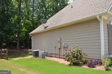 IMMACULATE RANCH HOME WITH FENCED BACKYARD! COVERED FRONT DOOR on The Frog Golf Club in Georgia - for sale on GolfHomes.com, golf home, golf lot