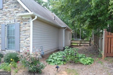 IMMACULATE RANCH HOME WITH FENCED BACKYARD! COVERED FRONT DOOR on The Frog Golf Club in Georgia - for sale on GolfHomes.com, golf home, golf lot