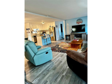 The key word with this home is NEW! New upgraded luxury vinyl on Fairway Village Golf Course in Florida - for sale on GolfHomes.com, golf home, golf lot