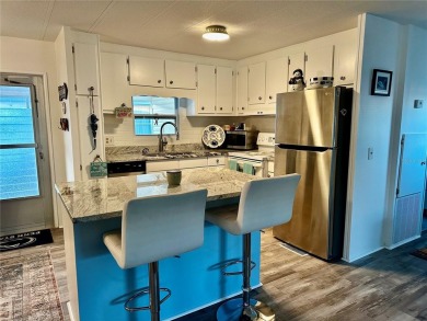 The key word with this home is NEW! New upgraded luxury vinyl on Fairway Village Golf Course in Florida - for sale on GolfHomes.com, golf home, golf lot