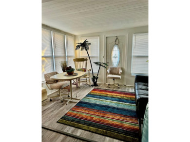 The key word with this home is NEW! New upgraded luxury vinyl on Fairway Village Golf Course in Florida - for sale on GolfHomes.com, golf home, golf lot