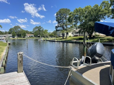 This waterfront resort home offers a lifestyle immersed in on Harbour Point Golf Club in North Carolina - for sale on GolfHomes.com, golf home, golf lot