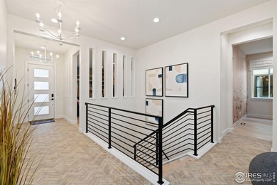 Indulge in unparalleled designer luxury with this on Raindance National Golf Course in Colorado - for sale on GolfHomes.com, golf home, golf lot