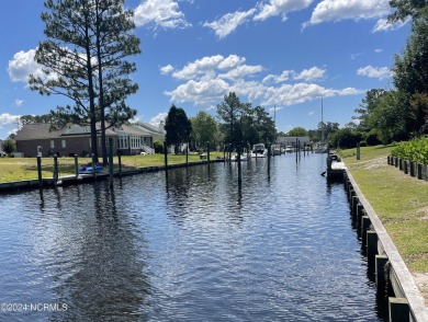 This waterfront resort home offers a lifestyle immersed in on Harbour Point Golf Club in North Carolina - for sale on GolfHomes.com, golf home, golf lot