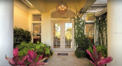 Reminiscent of On Golden Pond, this waterfront sanctuary will on TPC Prestancia in Florida - for sale on GolfHomes.com, golf home, golf lot