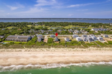 Oceanfront retreat in Roosevelt Beach offered fully furnished on The Country Club of the Crystal Coast in North Carolina - for sale on GolfHomes.com, golf home, golf lot