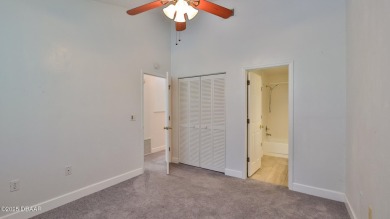 Step out your door with your golf clubs in hand!  The perfect on Daytona Beach Golf Club in Florida - for sale on GolfHomes.com, golf home, golf lot