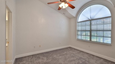 Step out your door with your golf clubs in hand!  The perfect on Daytona Beach Golf Club in Florida - for sale on GolfHomes.com, golf home, golf lot