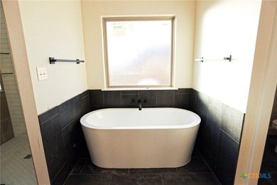 Step into modern luxury with this stunning 4 bedroom, 2.5 bath on Mill Creek Golf Club in Texas - for sale on GolfHomes.com, golf home, golf lot