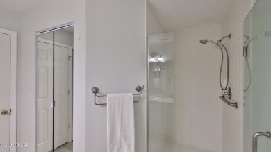 Step out your door with your golf clubs in hand!  The perfect on Daytona Beach Golf Club in Florida - for sale on GolfHomes.com, golf home, golf lot