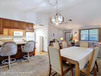 Welcome to this delightful two-bedroom, two-bath home located in on Heather Golf and Country Club in Florida - for sale on GolfHomes.com, golf home, golf lot