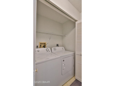Step out your door with your golf clubs in hand!  The perfect on Daytona Beach Golf Club in Florida - for sale on GolfHomes.com, golf home, golf lot