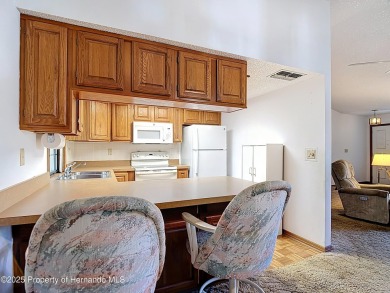 Welcome to this delightful two-bedroom, two-bath home located in on Heather Golf and Country Club in Florida - for sale on GolfHomes.com, golf home, golf lot