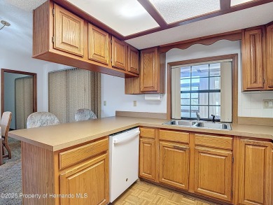 Welcome to this delightful two-bedroom, two-bath home located in on Heather Golf and Country Club in Florida - for sale on GolfHomes.com, golf home, golf lot