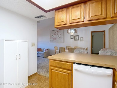 Welcome to this delightful two-bedroom, two-bath home located in on Heather Golf and Country Club in Florida - for sale on GolfHomes.com, golf home, golf lot
