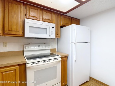 Welcome to this delightful two-bedroom, two-bath home located in on Heather Golf and Country Club in Florida - for sale on GolfHomes.com, golf home, golf lot