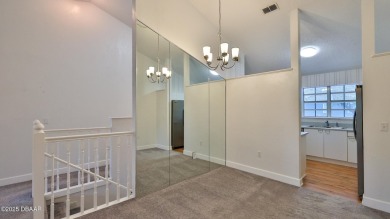 Step out your door with your golf clubs in hand!  The perfect on Daytona Beach Golf Club in Florida - for sale on GolfHomes.com, golf home, golf lot