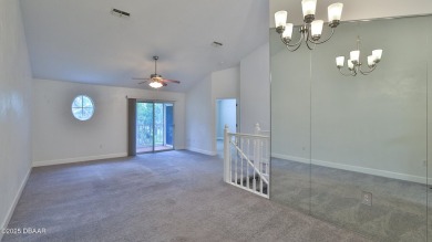 Step out your door with your golf clubs in hand!  The perfect on Daytona Beach Golf Club in Florida - for sale on GolfHomes.com, golf home, golf lot