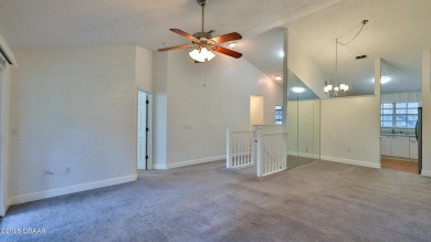 Step out your door with your golf clubs in hand!  The perfect on Daytona Beach Golf Club in Florida - for sale on GolfHomes.com, golf home, golf lot