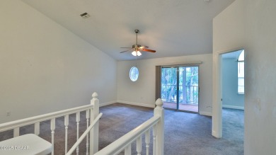 Step out your door with your golf clubs in hand!  The perfect on Daytona Beach Golf Club in Florida - for sale on GolfHomes.com, golf home, golf lot