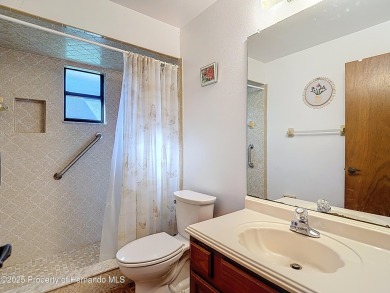 Welcome to this delightful two-bedroom, two-bath home located in on Heather Golf and Country Club in Florida - for sale on GolfHomes.com, golf home, golf lot