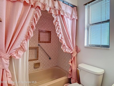Welcome to this delightful two-bedroom, two-bath home located in on Heather Golf and Country Club in Florida - for sale on GolfHomes.com, golf home, golf lot