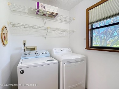 Welcome to this delightful two-bedroom, two-bath home located in on Heather Golf and Country Club in Florida - for sale on GolfHomes.com, golf home, golf lot